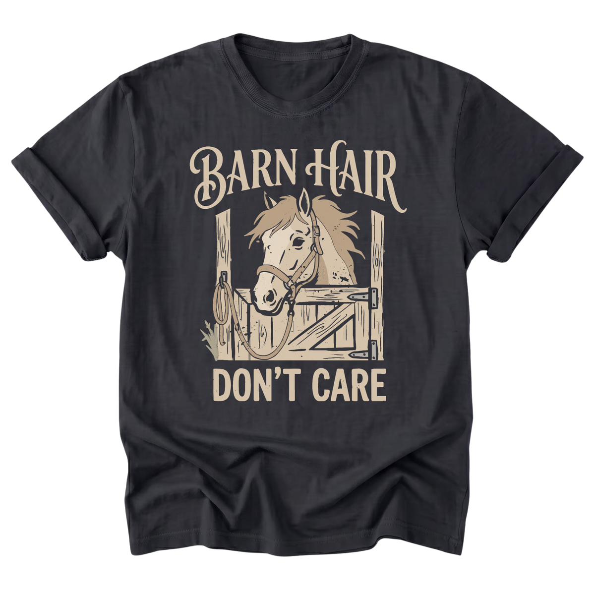 A black t-shirt with a vintage-style graphic of a horse in a barn stall and the text 'BARN HAIR DON'T CARE' in beige.