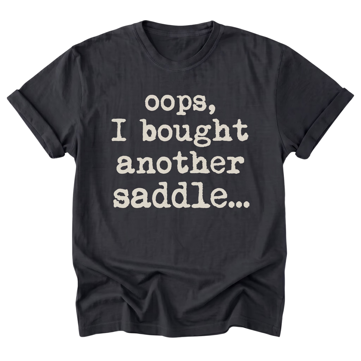 A black t-shirt with rolled-up sleeves, featuring the text 'oops, I bought another saddle.