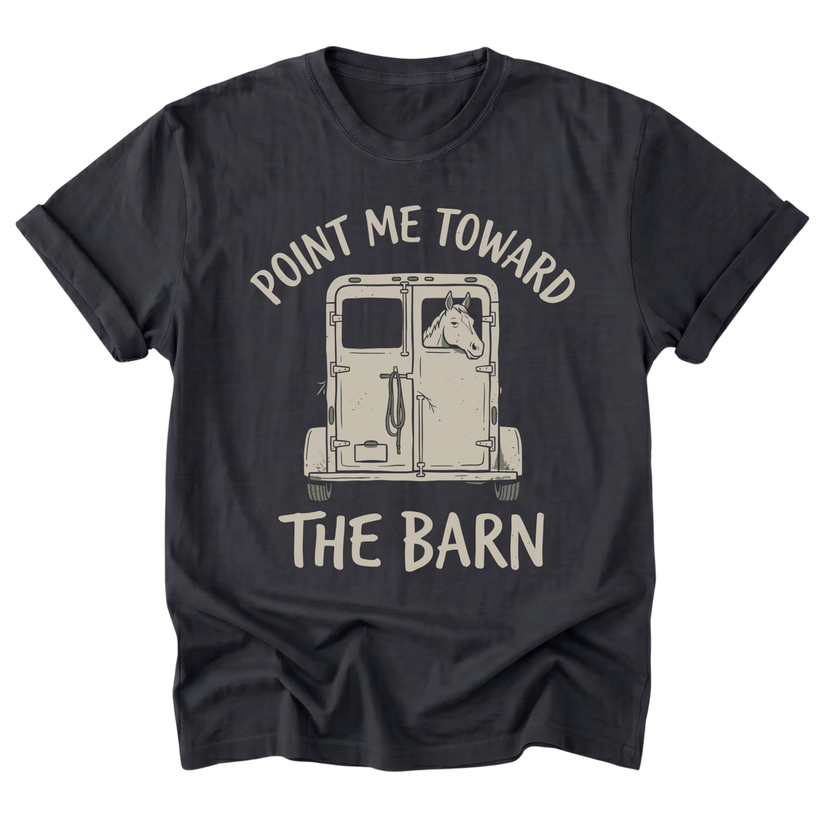 A black t-shirt with a graphic print of a horse in a stall and the text 'POINT ME TOWARD THE BARN' in a distressed cream font, displayed on a solid white background.