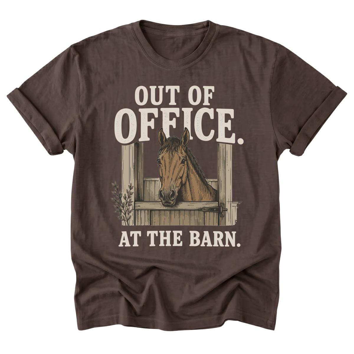 A dark brown short-sleeve t-shirt with a graphic print of a horse in a stable and the text 'OUT OF OFFICE. AT THE BARN.