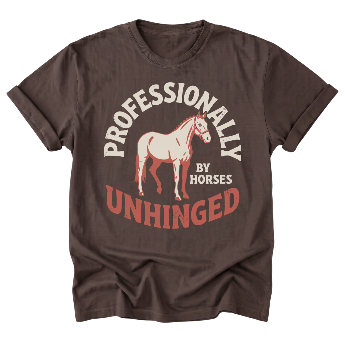 A dark brown short-sleeve t-shirt with a graphic print featuring a light brown horse and the text 'PROFESSIONALLY UNHINGED BY HORSES' in cream and reddish-brown lettering.