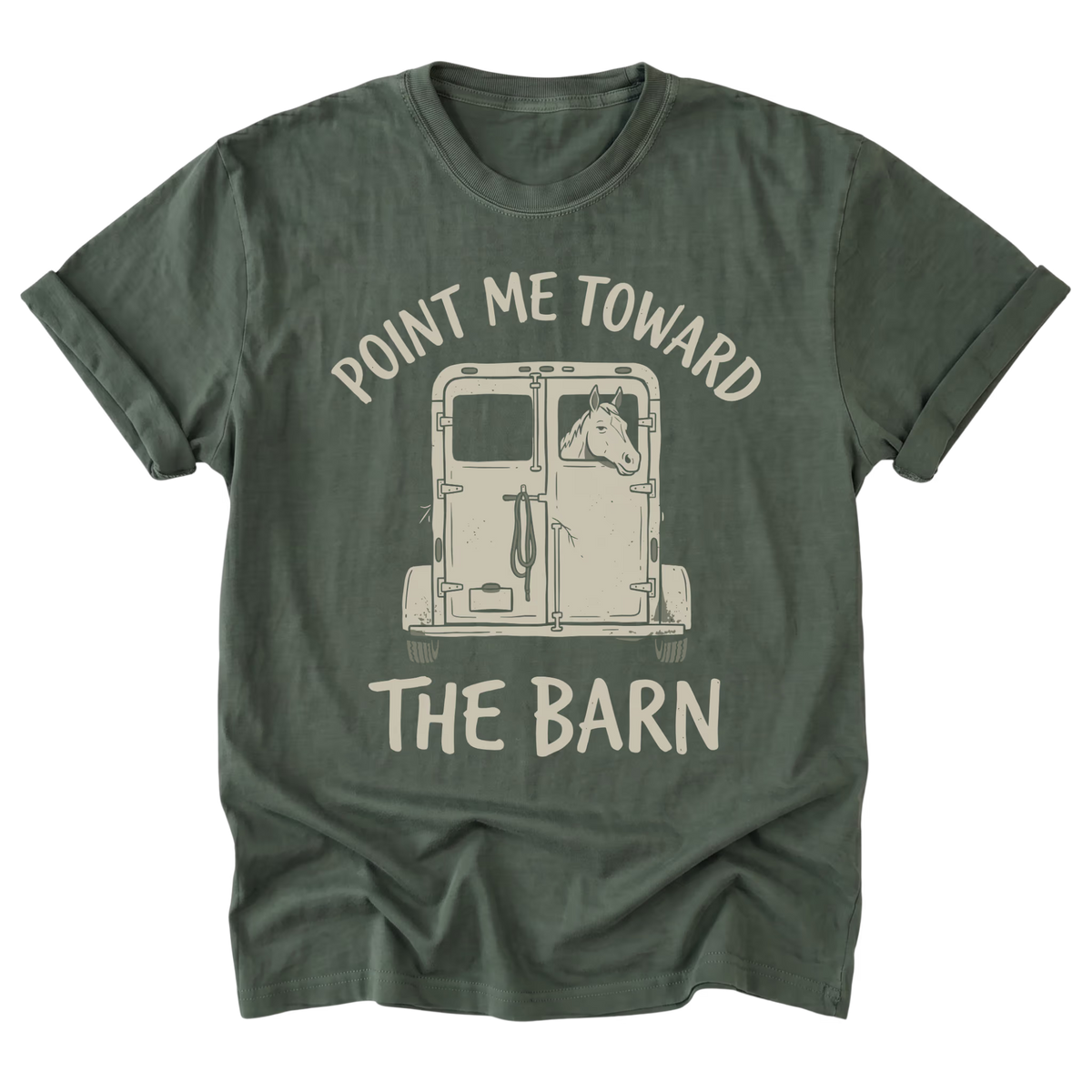 A military green short-sleeve t-shirt with a graphic print of a horse in a trailer and the text 'POINT ME TOWARD THE BARN' in a light beige color, displayed on a solid white background.