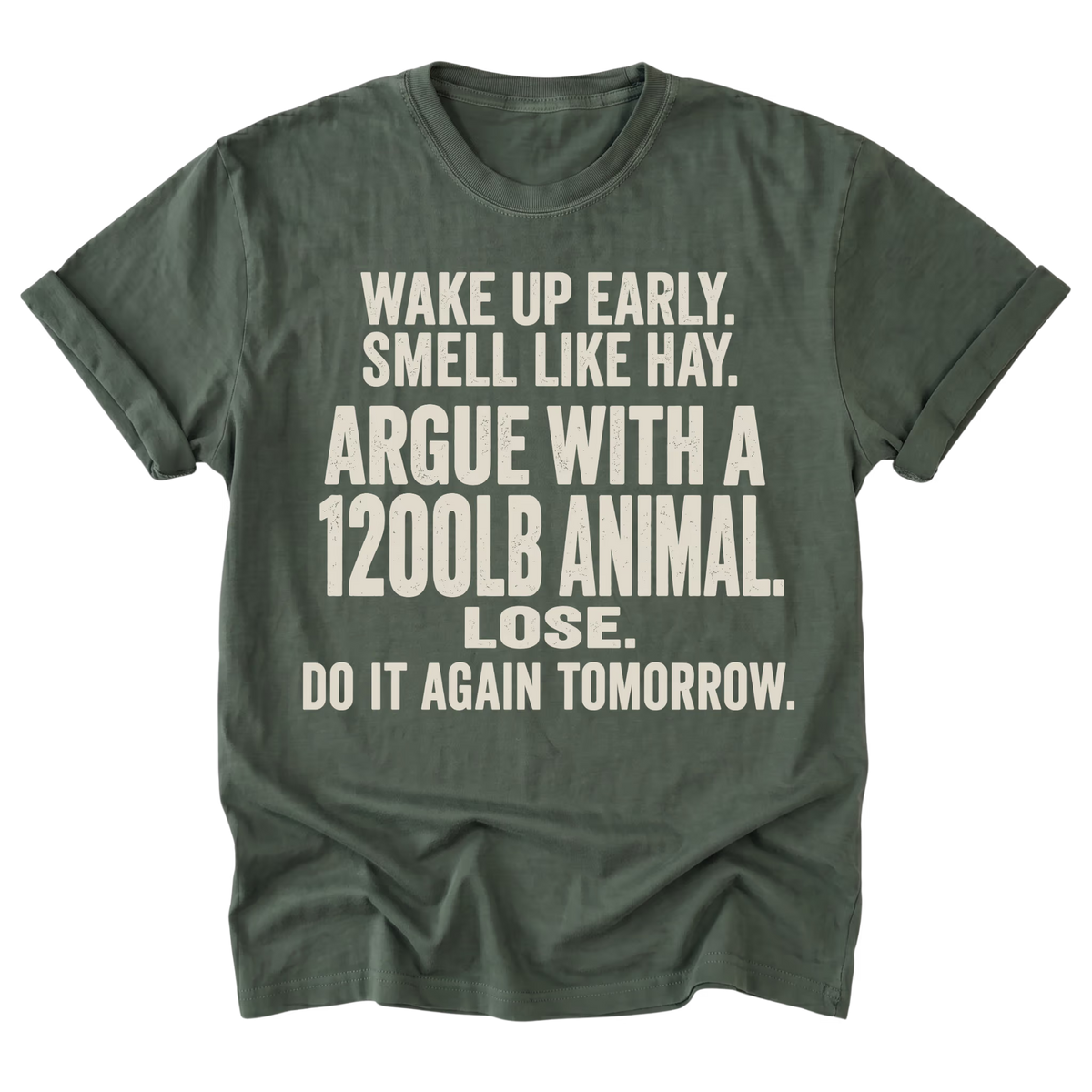 An military green short-sleeve t-shirt with a humorous text graphic printed in cream on the front, laid flat against a white background.