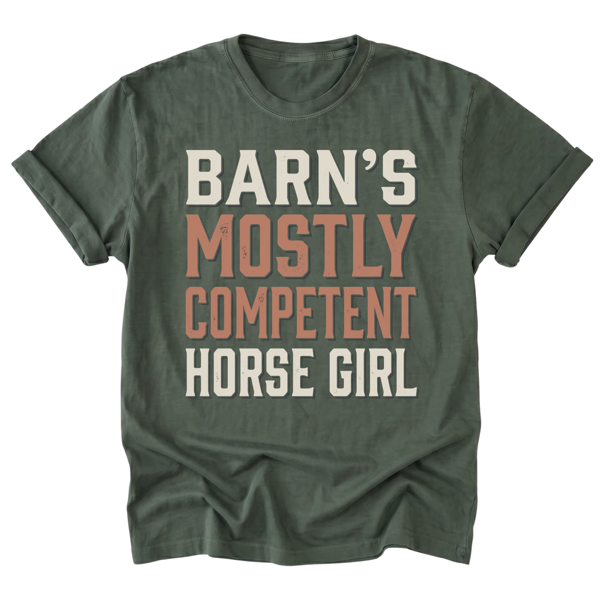 A military green short-sleeve t-shirt with a distressed typographic graphic reading 'BARN'S MOSTLY COMPETENT HORSE GIRL' in cream and muted terracotta colors, displayed on a solid white background.