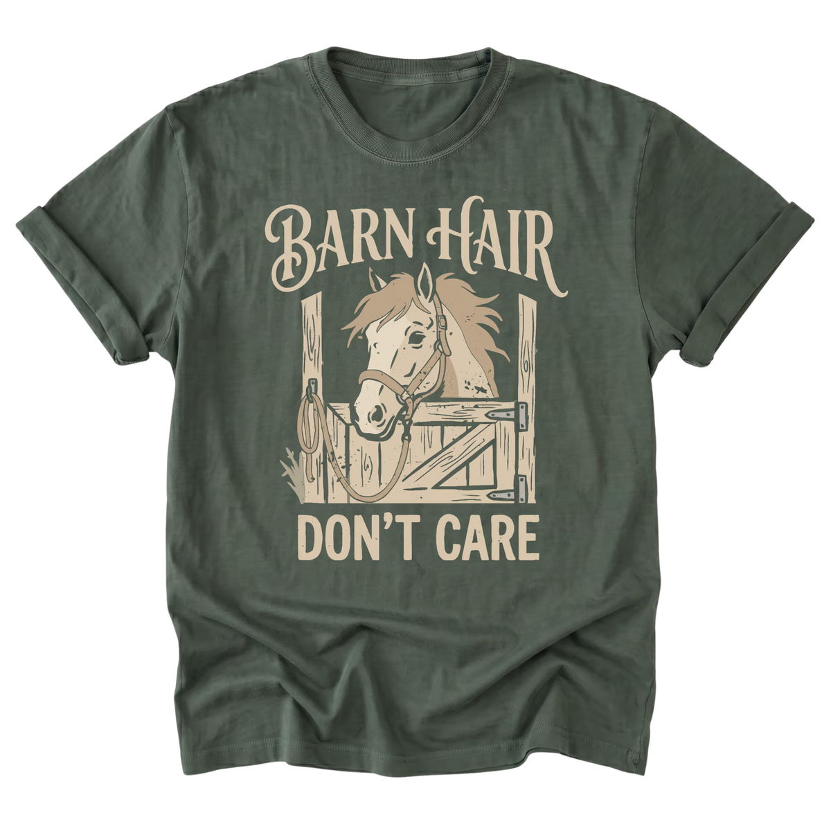 An military green short-sleeve t-shirt with a vintage-style graphic of a horse in a stable and the text 'BARN HAIR DON'T CARE' printed in beige.