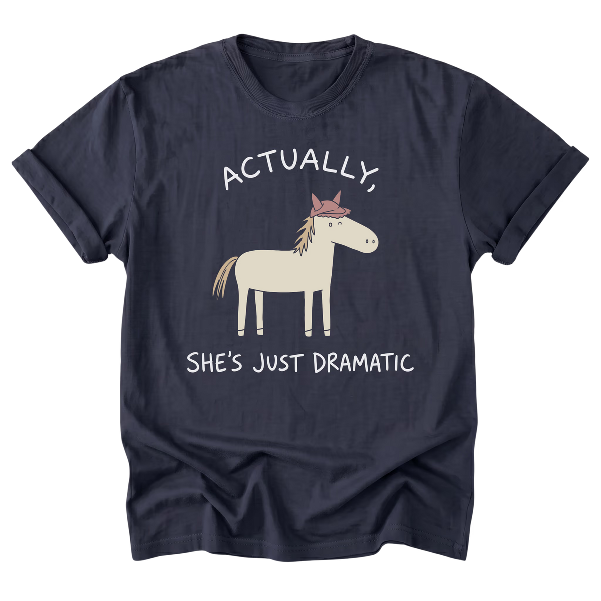 A navy blue short-sleeve t-shirt with a graphic of a cartoon horse wearing a pink crown, accompanied by the text 'ACTUALLY, SHE'S JUST DRAMATIC' in white.