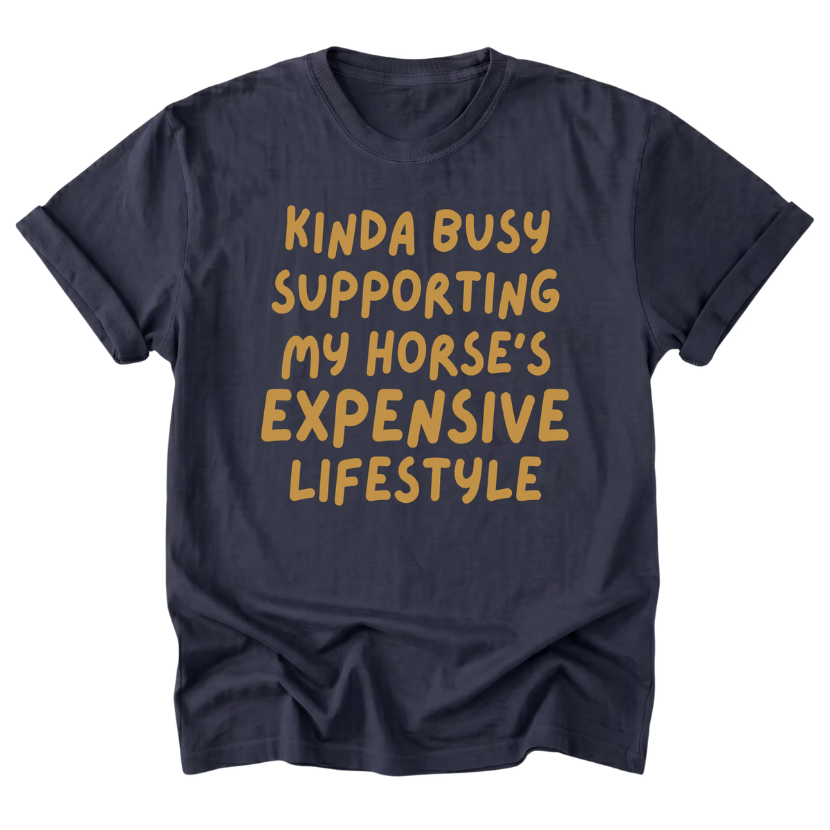 A navy blue t-shirt featuring the text 'KIDNA BUSY SUPPORTING MY HORSES'S EXPENSIVE LIFESTYLE' printed on the front in gold color.