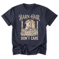 A navy blue short-sleeve t-shirt with a graphic print of a horse in a barn stall and the text 'BARN HAIR DON'T CARE' in a beige font, shown on a plain white background.