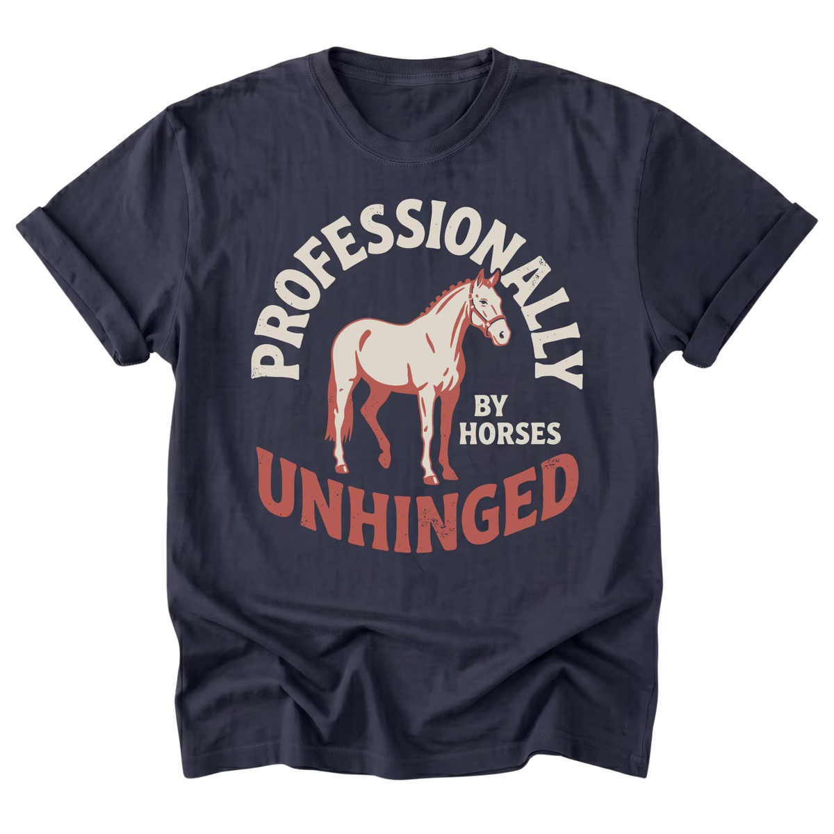 A navy blue short-sleeve t-shirt with a graphic print featuring a light-colored horse and the text 'PROFESSIONALLY UNHINGED BY HORSES' in cream and rust-red tones, displayed on a clean white background.