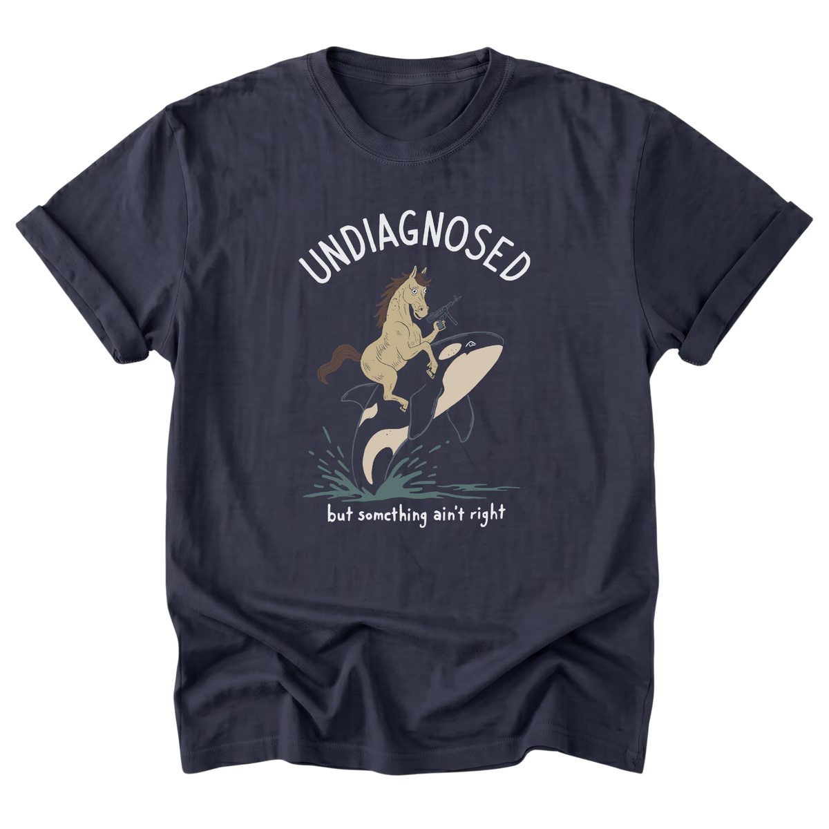 A navy blue t-shirt featuring the text 'UNDIAGNOSED but something ain't right' with a design of a horse with a machine gun and riding a killer whale printed on the front.