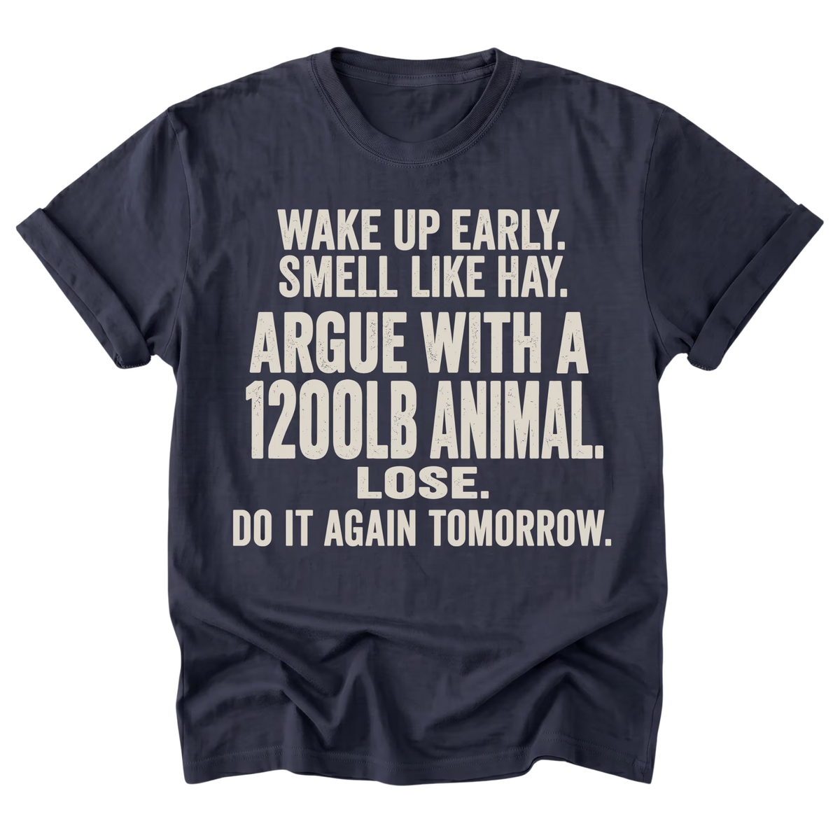 A navy blue short-sleeve t-shirt with a bold, distressed cream-colored text graphic on the front, displayed against a solid white background.