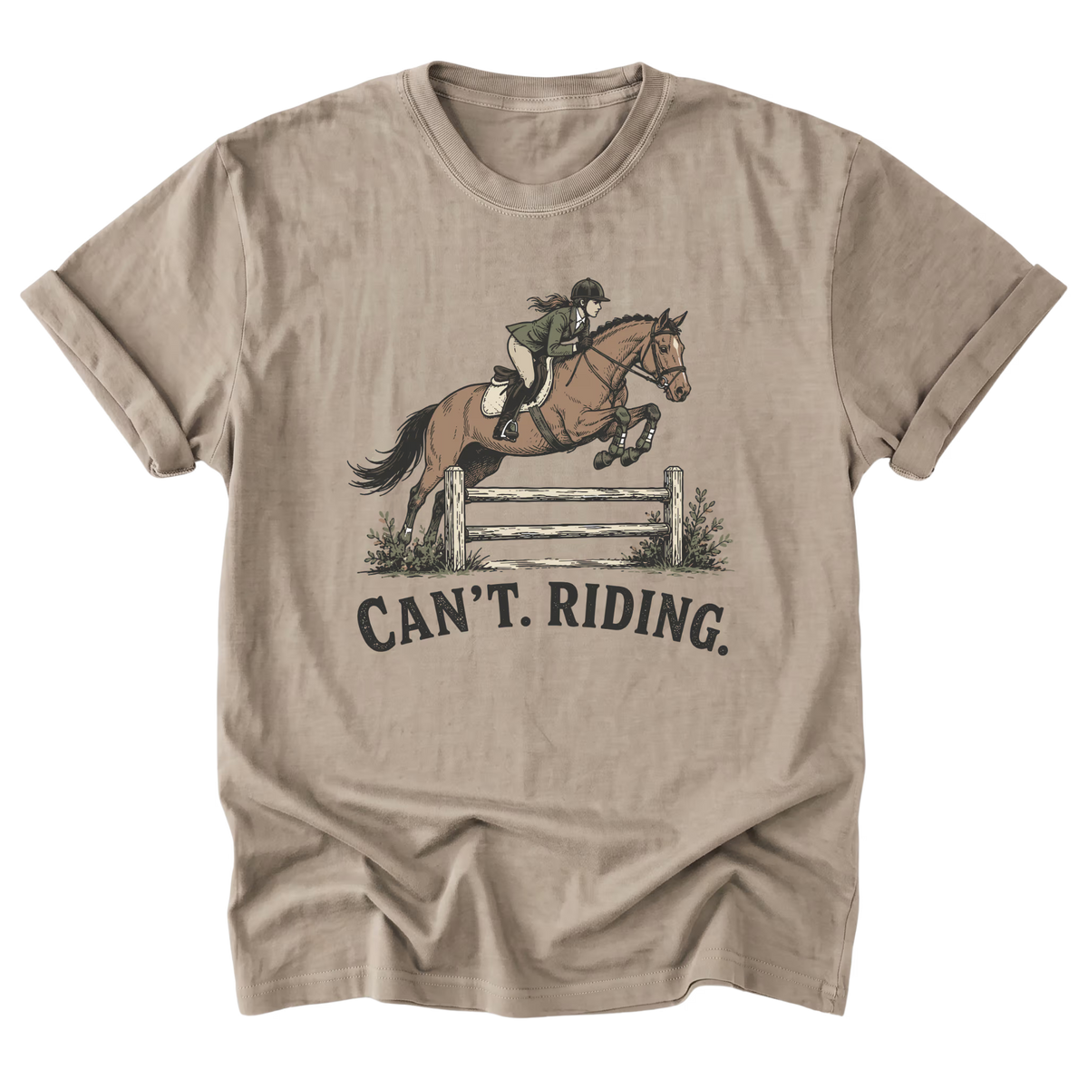 A beige sand crewneck t-shirt featuring a graphic of a horse and rider jumping a fence, with the text 'CAN'T. RIDING.
