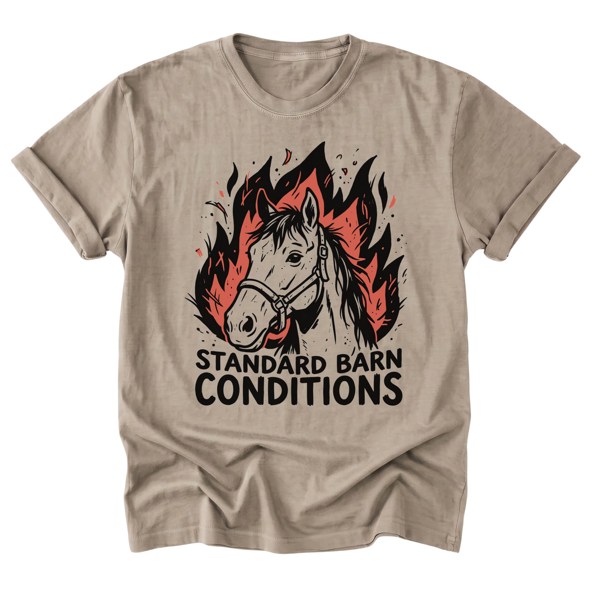 A beige sand crewneck t-shirt with a graphic of a horse head surrounded by red and black flames, with the text 'STANDARD BARN CONDITIONS' printed below in black.