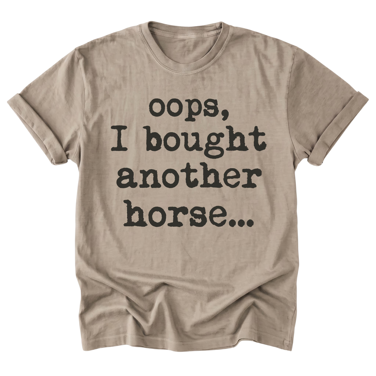 A sand beige short-sleeve t-shirt with the text 'oops, I bought another horse.