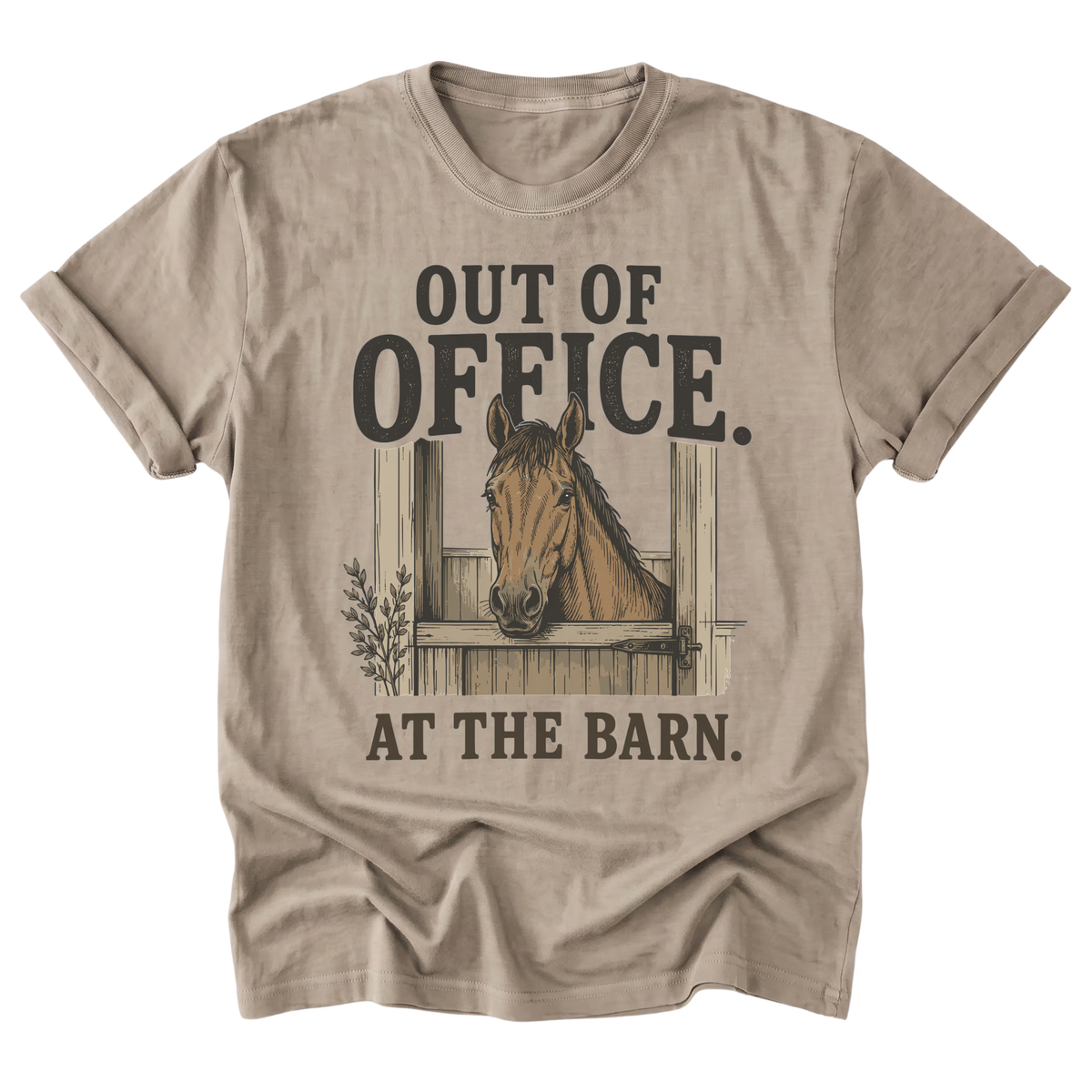 A beige sand crewneck t-shirt with a graphic print of a horse in a barn window and the text 'OUT OF OFFICE. AT THE BARN.'